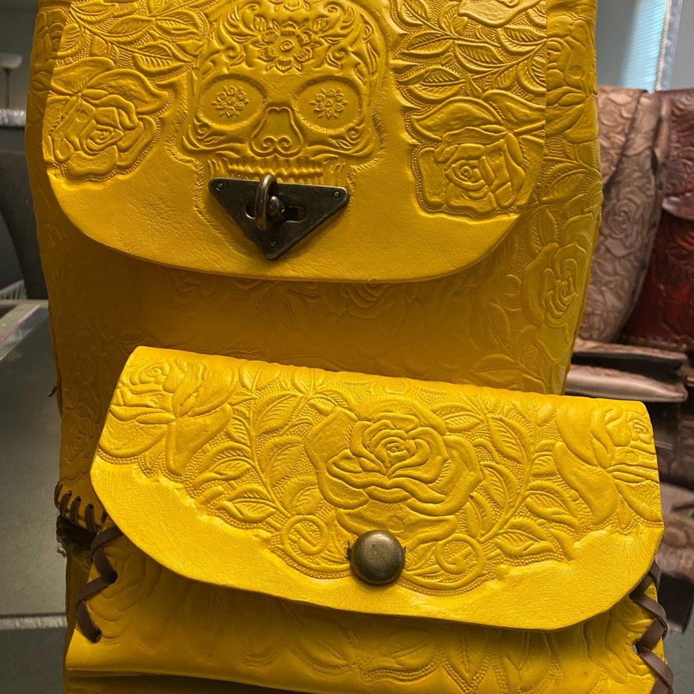 Hand Tooled Leather Backpack & Clutch